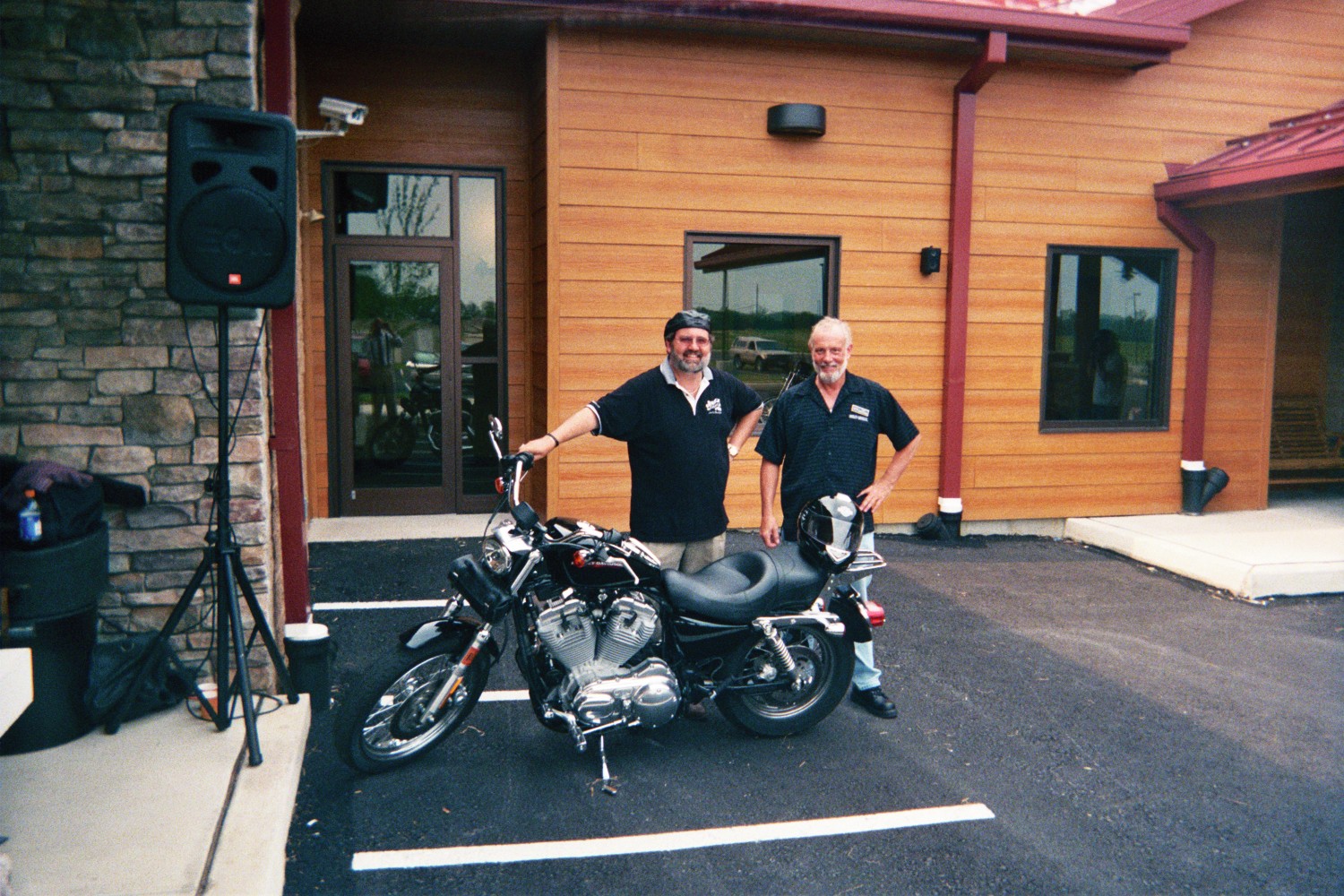 General manager Scott, Kirk and the Wise Guy 2005 Harley
Rode the bike to th Appalachian Harley Davidson show..and got drenched on the way home!
