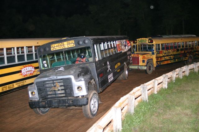 School bus racing gets the grip out of turn three..
